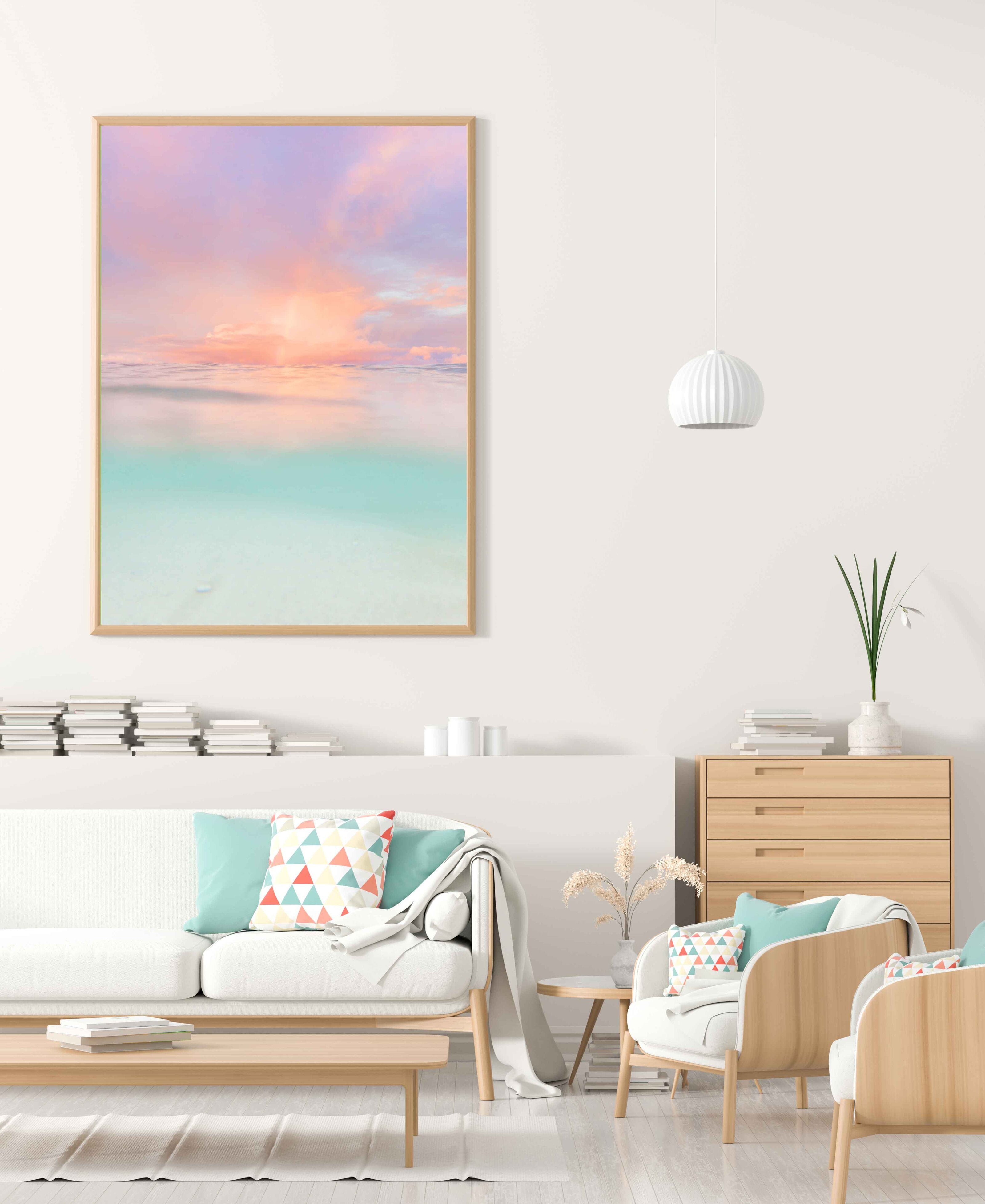 Print of a soft pastel sunset going down over bright blue clear ocean on Hawaii